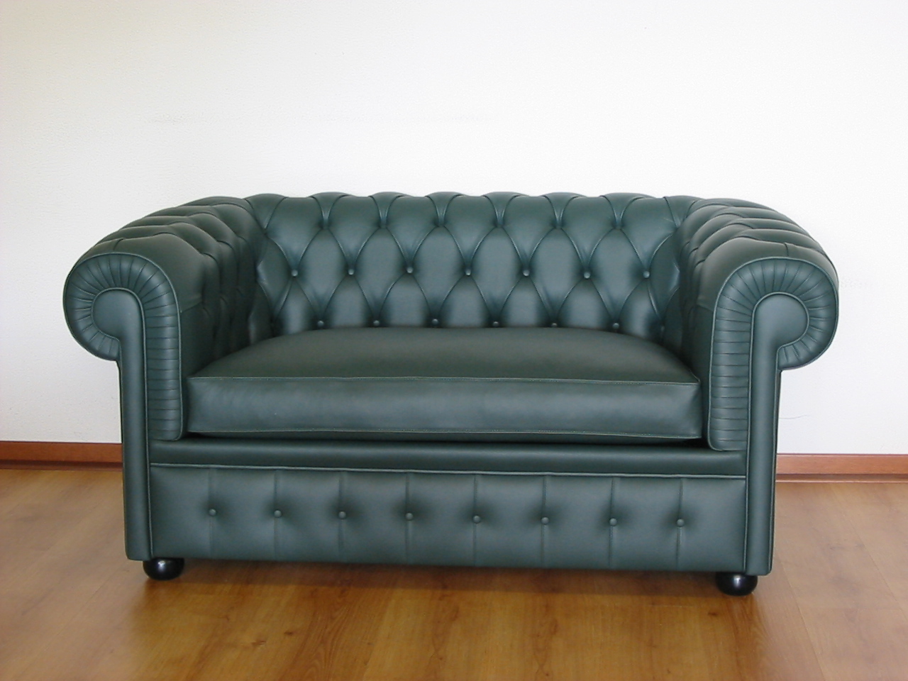 Divano letto chesterfield